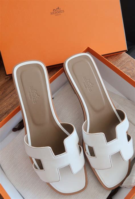 hermes white oran sandals.